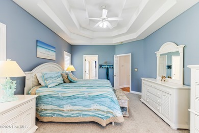 Experience the best of coastal Carolina living in this elegant on Carolina National Golf Club in North Carolina - for sale on GolfHomes.com, golf home, golf lot