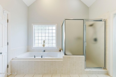 Experience the best of coastal Carolina living in this elegant on Carolina National Golf Club in North Carolina - for sale on GolfHomes.com, golf home, golf lot