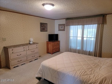 This is a lovely 3 bedroom 2 bath home. Open floorplan with on 3 Parks Fairways in Arizona - for sale on GolfHomes.com, golf home, golf lot