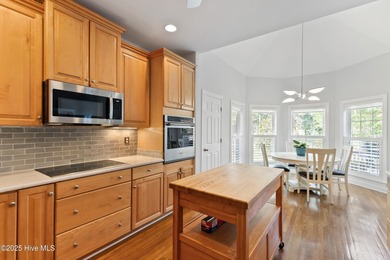 Experience the best of coastal Carolina living in this elegant on Carolina National Golf Club in North Carolina - for sale on GolfHomes.com, golf home, golf lot