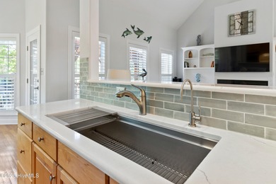 Experience the best of coastal Carolina living in this elegant on Carolina National Golf Club in North Carolina - for sale on GolfHomes.com, golf home, golf lot