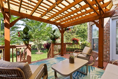 Experience the best of coastal Carolina living in this elegant on Carolina National Golf Club in North Carolina - for sale on GolfHomes.com, golf home, golf lot