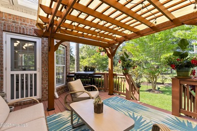 Experience the best of coastal Carolina living in this elegant on Carolina National Golf Club in North Carolina - for sale on GolfHomes.com, golf home, golf lot