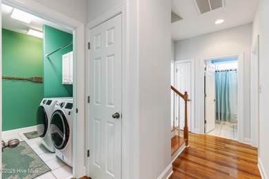 Experience the best of coastal Carolina living in this elegant on Carolina National Golf Club in North Carolina - for sale on GolfHomes.com, golf home, golf lot