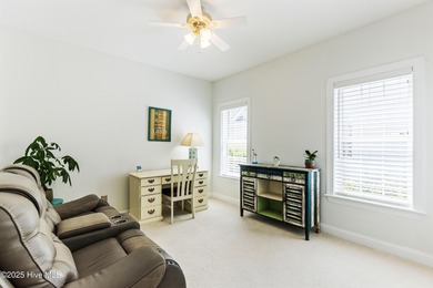 Experience the best of coastal Carolina living in this elegant on Carolina National Golf Club in North Carolina - for sale on GolfHomes.com, golf home, golf lot