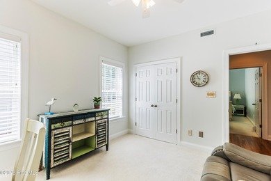 Experience the best of coastal Carolina living in this elegant on Carolina National Golf Club in North Carolina - for sale on GolfHomes.com, golf home, golf lot