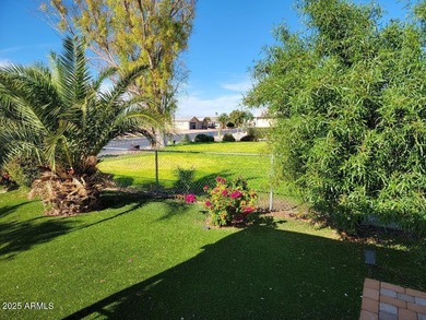 This is a lovely 3 bedroom 2 bath home. Open floorplan with on 3 Parks Fairways in Arizona - for sale on GolfHomes.com, golf home, golf lot