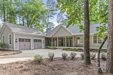 Situated on a large, flat property, this expansive, newly on Reynolds Lake Oconee - The Preserve in Georgia - for sale on GolfHomes.com, golf home, golf lot