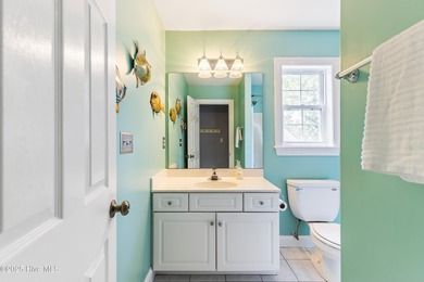 Experience the best of coastal Carolina living in this elegant on Carolina National Golf Club in North Carolina - for sale on GolfHomes.com, golf home, golf lot