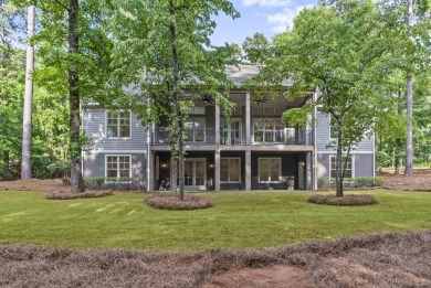 Situated on a large, flat property, this expansive, newly on Reynolds Lake Oconee - The Preserve in Georgia - for sale on GolfHomes.com, golf home, golf lot