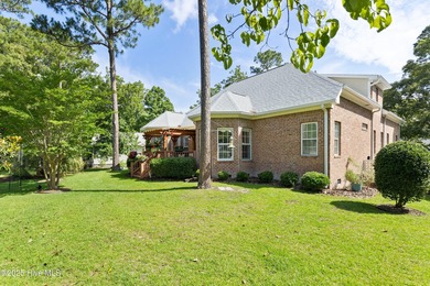 Experience the best of coastal Carolina living in this elegant on Carolina National Golf Club in North Carolina - for sale on GolfHomes.com, golf home, golf lot