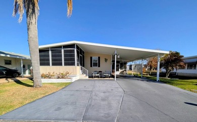 Welcome to this beautifully decorated home with new double pane on Grasslands Golf and Country Club in Florida - for sale on GolfHomes.com, golf home, golf lot
