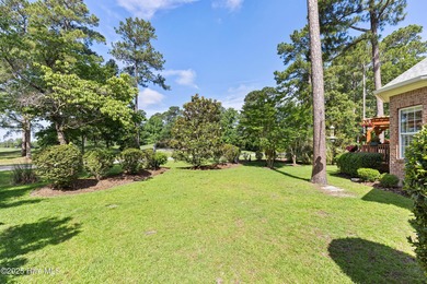 Experience the best of coastal Carolina living in this elegant on Carolina National Golf Club in North Carolina - for sale on GolfHomes.com, golf home, golf lot