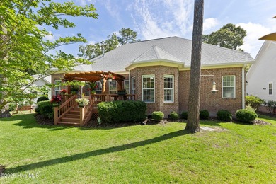 Experience the best of coastal Carolina living in this elegant on Carolina National Golf Club in North Carolina - for sale on GolfHomes.com, golf home, golf lot