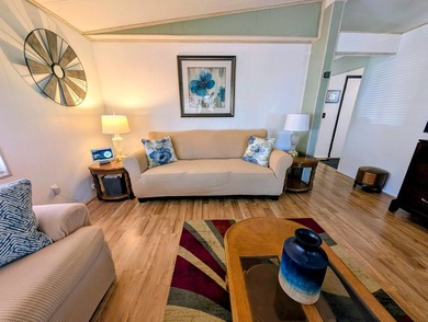 Welcome to this beautifully decorated home with new double pane on Grasslands Golf and Country Club in Florida - for sale on GolfHomes.com, golf home, golf lot