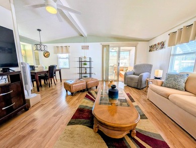 Welcome to this beautifully decorated home with new double pane on Grasslands Golf and Country Club in Florida - for sale on GolfHomes.com, golf home, golf lot