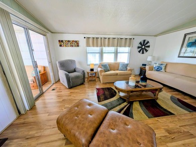 Welcome to this beautifully decorated home with new double pane on Grasslands Golf and Country Club in Florida - for sale on GolfHomes.com, golf home, golf lot