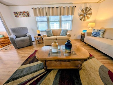 Welcome to this beautifully decorated home with new double pane on Grasslands Golf and Country Club in Florida - for sale on GolfHomes.com, golf home, golf lot