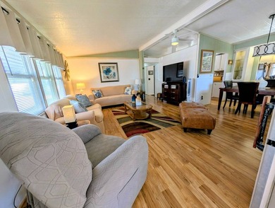 Welcome to this beautifully decorated home with new double pane on Grasslands Golf and Country Club in Florida - for sale on GolfHomes.com, golf home, golf lot