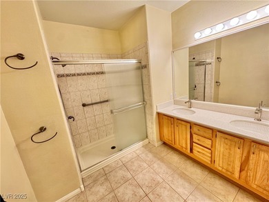 GOLF, LAKE & MOUNTAIN VIEWS! MOVE-IN READY UPSTAIRS CORNER UNIT on Painted Desert Golf Club in Nevada - for sale on GolfHomes.com, golf home, golf lot