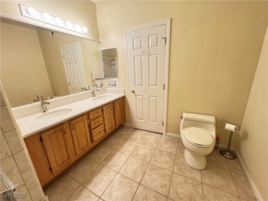 GOLF, LAKE & MOUNTAIN VIEWS! MOVE-IN READY UPSTAIRS CORNER UNIT on Painted Desert Golf Club in Nevada - for sale on GolfHomes.com, golf home, golf lot