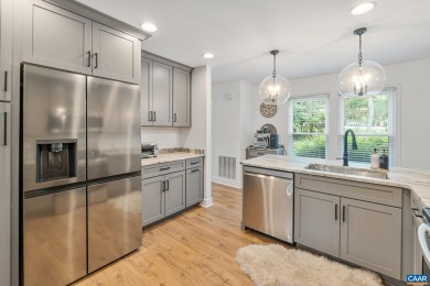Enjoy the best of both worlds--golf and waterfront on Lake Monticello Golf Course in Virginia - for sale on GolfHomes.com, golf home, golf lot