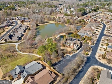 Situated in the serene, gated Cadence community, thoughtfully on Woodmont Golf and Country Club in Georgia - for sale on GolfHomes.com, golf home, golf lot