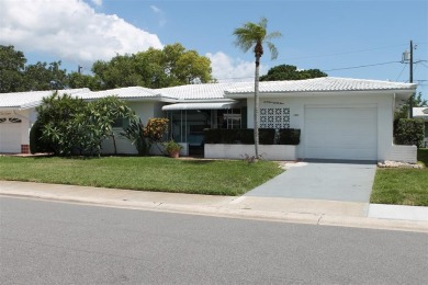 This Popular 2-Bed, 2-Bath, Eden Model, has a very spacious on Mainlands Golf Club in Florida - for sale on GolfHomes.com, golf home, golf lot
