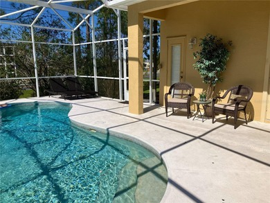 Welcome to this beautifully maintained 4-bedroom, 3-bathroom on Highlands Reserve Golf Club in Florida - for sale on GolfHomes.com, golf home, golf lot