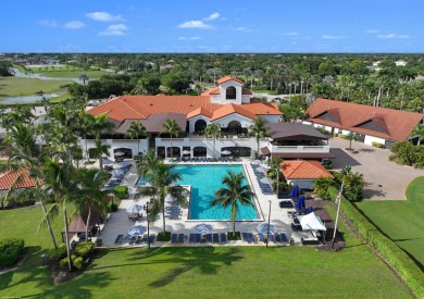 This stylish, renovated and nicely decorated home is located in on The Wanderers Club in Florida - for sale on GolfHomes.com, golf home, golf lot