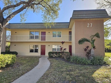 Enjoy relaxed Florida living in this desirable first-floor on Vero Beach South Golf Course in Florida - for sale on GolfHomes.com, golf home, golf lot