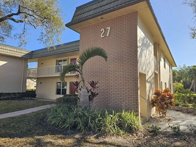 Enjoy relaxed Florida living in this desirable first-floor on Vero Beach South Golf Course in Florida - for sale on GolfHomes.com, golf home, golf lot