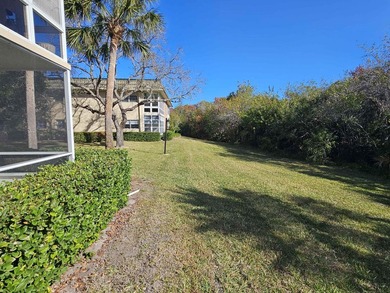 Enjoy relaxed Florida living in this desirable first-floor on Vero Beach South Golf Course in Florida - for sale on GolfHomes.com, golf home, golf lot