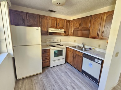 Enjoy relaxed Florida living in this desirable first-floor on Vero Beach South Golf Course in Florida - for sale on GolfHomes.com, golf home, golf lot