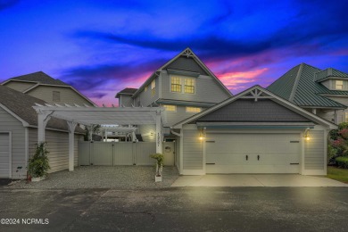 This lovely 3 bedroom 3 bathroom waterfront home was built in on Brick Landing Plantation Yacht and Golf Club in North Carolina - for sale on GolfHomes.com, golf home, golf lot