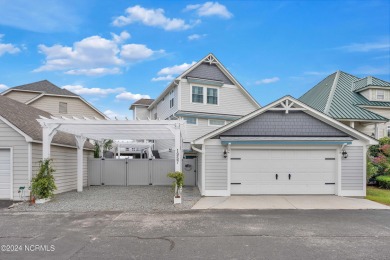 This lovely 3 bedroom 3 bathroom waterfront home was built in on Brick Landing Plantation Yacht and Golf Club in North Carolina - for sale on GolfHomes.com, golf home, golf lot