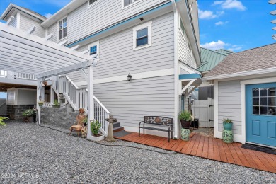 This lovely 3 bedroom 3 bathroom waterfront home was built in on Brick Landing Plantation Yacht and Golf Club in North Carolina - for sale on GolfHomes.com, golf home, golf lot