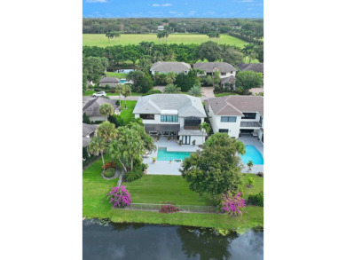 Nestled on one of the polo club's most picturesque streets, this on Palm Beach Polo and Country Club in Florida - for sale on GolfHomes.com, golf home, golf lot