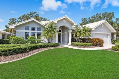 THIS LOVELY LAKEFRONT HOME IS SITUATED IN EATON PLACE, WHICH IS on University Park Country Club in Florida - for sale on GolfHomes.com, golf home, golf lot