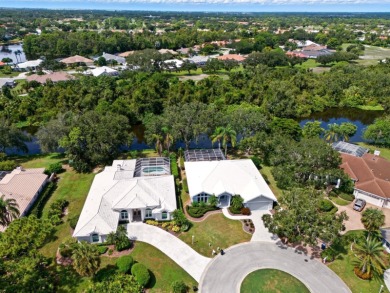 THIS LOVELY LAKEFRONT HOME IS SITUATED IN EATON PLACE, WHICH IS on University Park Country Club in Florida - for sale on GolfHomes.com, golf home, golf lot