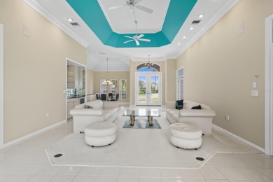 THIS LOVELY LAKEFRONT HOME IS SITUATED IN EATON PLACE, WHICH IS on University Park Country Club in Florida - for sale on GolfHomes.com, golf home, golf lot