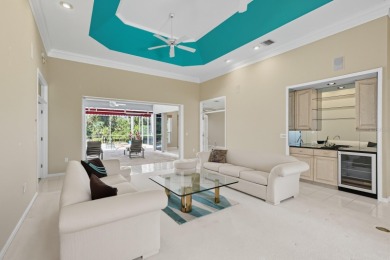 THIS LOVELY LAKEFRONT HOME IS SITUATED IN EATON PLACE, WHICH IS on University Park Country Club in Florida - for sale on GolfHomes.com, golf home, golf lot