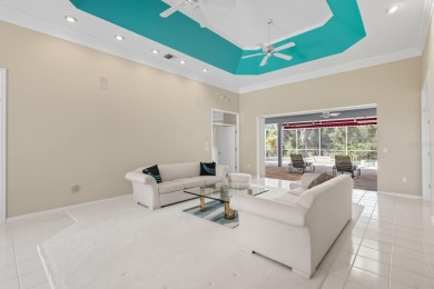 THIS LOVELY LAKEFRONT HOME IS SITUATED IN EATON PLACE, WHICH IS on University Park Country Club in Florida - for sale on GolfHomes.com, golf home, golf lot