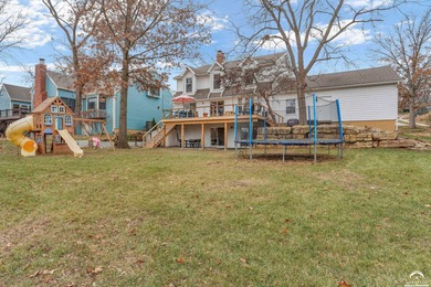 Spectacularly updated 5-bedroom, 4-bathroom, 3-car garage home on Alvamar Orchards in Kansas - for sale on GolfHomes.com, golf home, golf lot