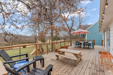 Spectacularly updated 5-bedroom, 4-bathroom, 3-car garage home on Alvamar Orchards in Kansas - for sale on GolfHomes.com, golf home, golf lot