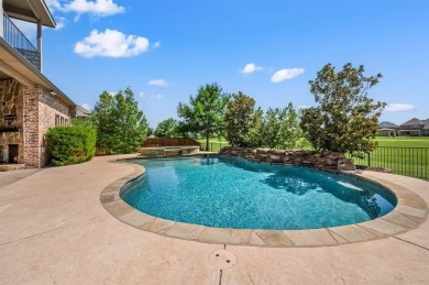 Situated on a .3-acre lot overlooking Hole #4 of the Whitworth on Trophy Club of Dallas in Texas - for sale on GolfHomes.com, golf home, golf lot