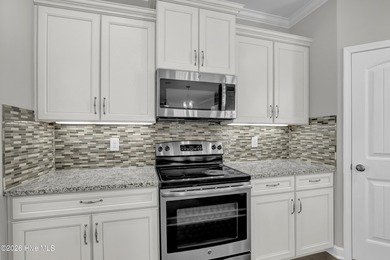 Welcome to this southern charmer home equipped with energy on Olde Point Golf and Country Club in North Carolina - for sale on GolfHomes.com, golf home, golf lot