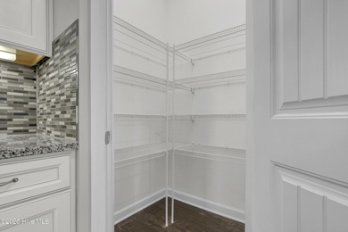 Welcome to this southern charmer home equipped with energy on Olde Point Golf and Country Club in North Carolina - for sale on GolfHomes.com, golf home, golf lot