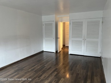 Discover this charming one-bedroom, one-bathroom apartment with on Silver Lake Golf Course in New York - for sale on GolfHomes.com, golf home, golf lot