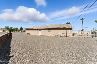Welcome to this Cul-de-Sac Gem with Pool, RV Parking  30' Deep on London Bridge Golf Course in Arizona - for sale on GolfHomes.com, golf home, golf lot